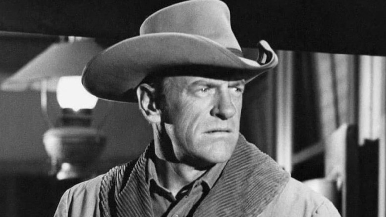 Matt Dillon (James Arness) glares to his left in Gunsmoke