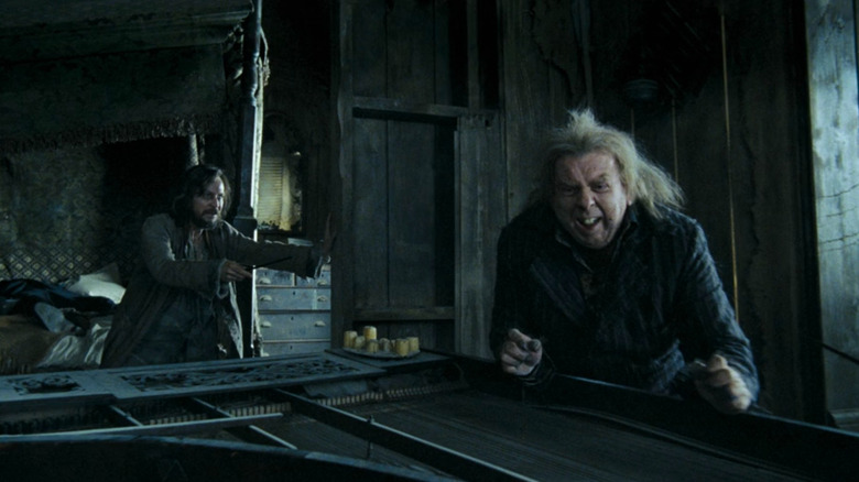 Sirius Black (Gary Oldman) pointing at Peter Pettigrew (Timothy Spall) in Harry Potter and the Prisoner of Azkaban