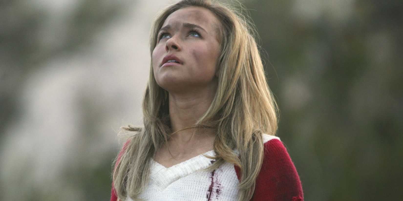 Hayden Panettiere as Claire Bennet in Heroes, dressed in the cheerleader outfit, staring up at the sky