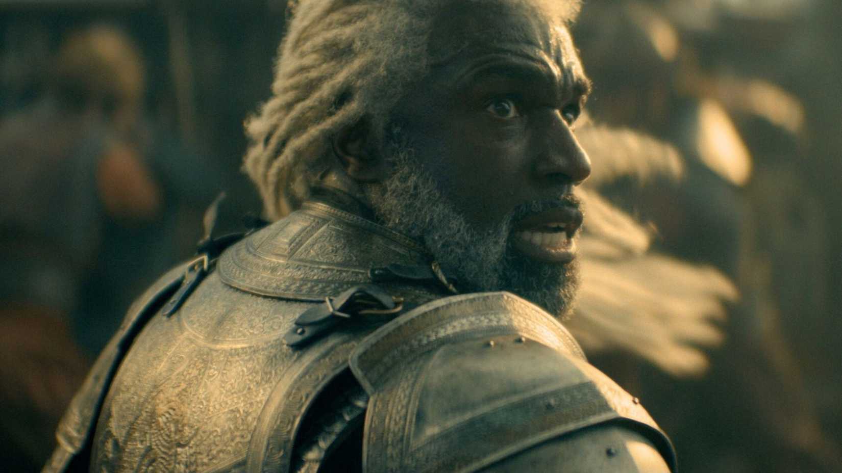 Corlys Velaryon (Steve Toussaint) looking over his shoulder in battle in House of the Dragon.
