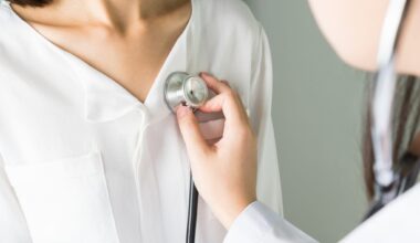 Doctor is using a stethoscope for patients patient examination. To hear the heart rate, For patients with heart disease.
