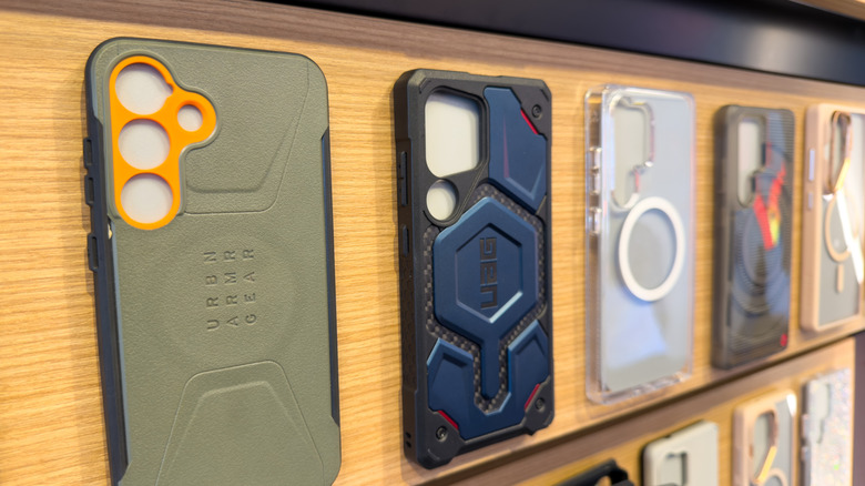 rugged phone cases on display at a store next to regular phone cases