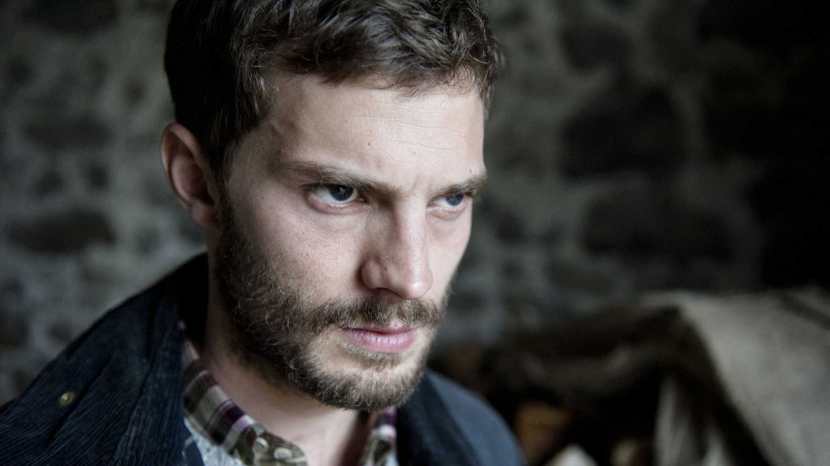  Paul Spector glares while looking to the side in The Fall