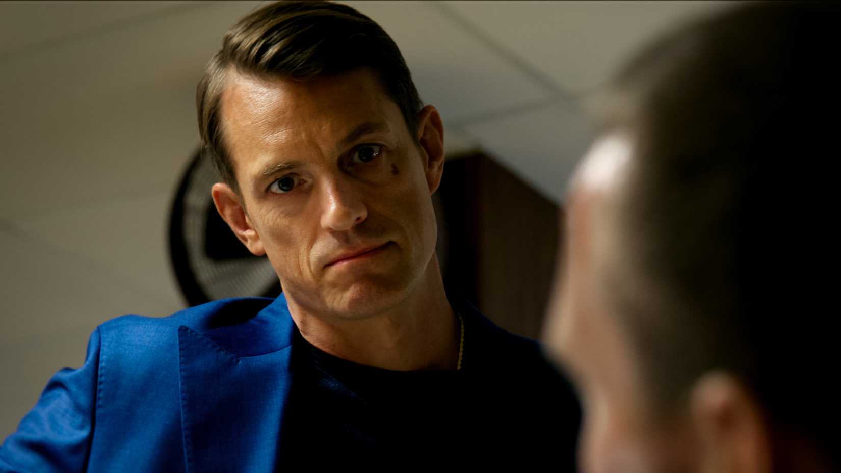 Joel Kinnaman's Tom looking judgingly down at Tobias Santelmann's Harry in Jo Nesbø's Detective Hole