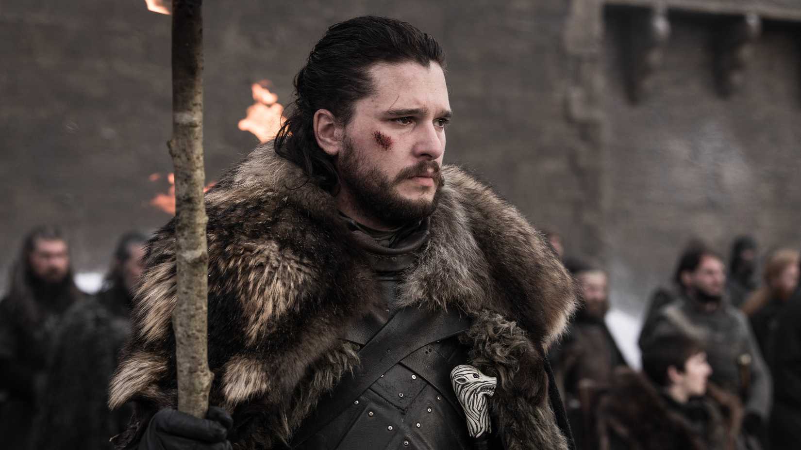 Jon Snow holding a staff in Game of Thrones season 8