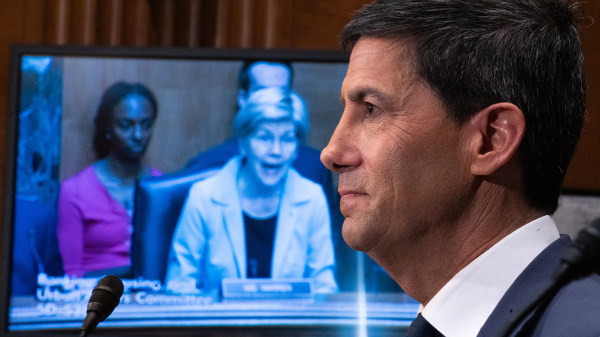 Kevin Warsh is seen during a confirmation hearing before the Senate Banking, Housing and Urban Affairs Committee.