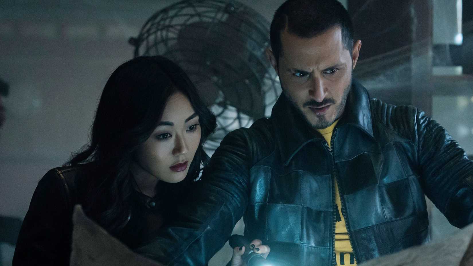 Kimiko (Karen Fukuhara) and Frenchie (Tomer Capone) looking at a map in The Boys season 5