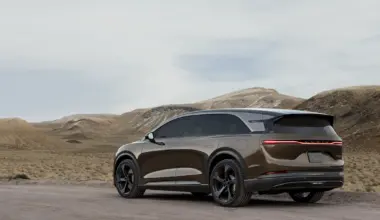 Three Lucid Airs driving down the highway.