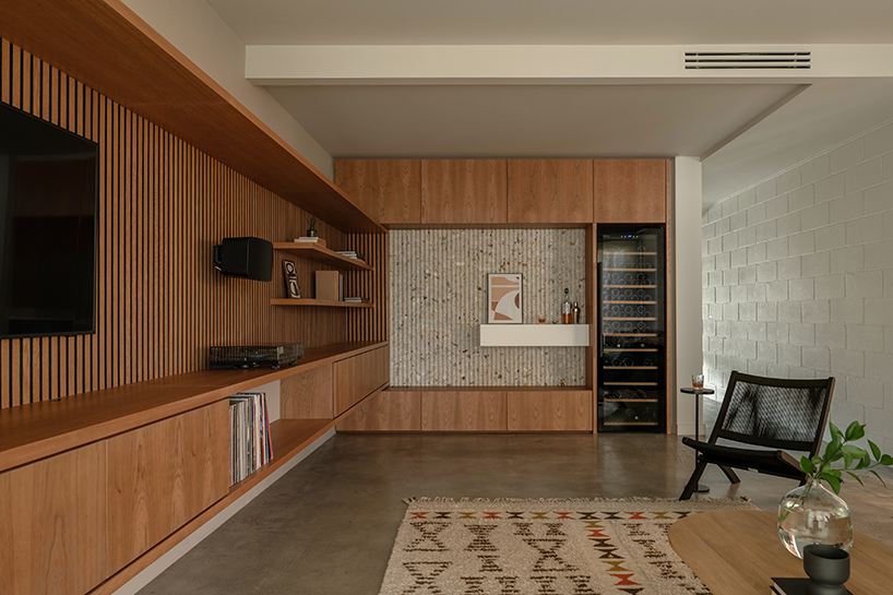 interlocking millwork volumes reshape brooklyn apartment into layered interior - 1