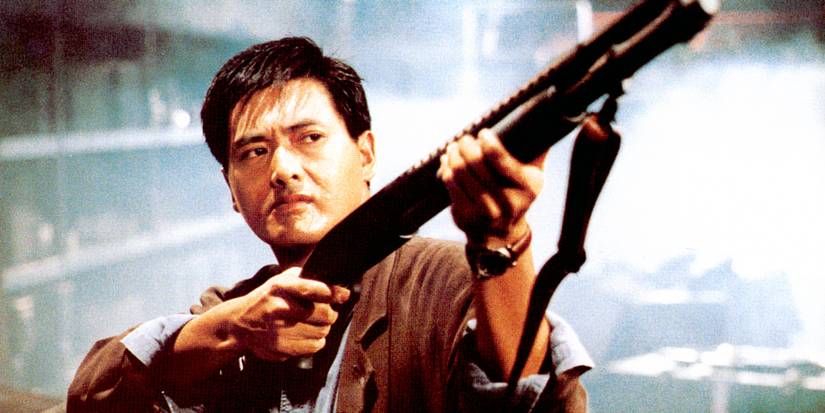 Chow Yun-Fat aiming a rifle in HARD-BOILED