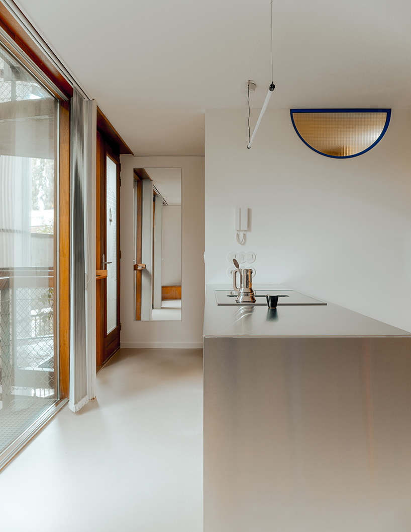 former sewage tank transforms into minimal geometric apartment in amsterdam - 3