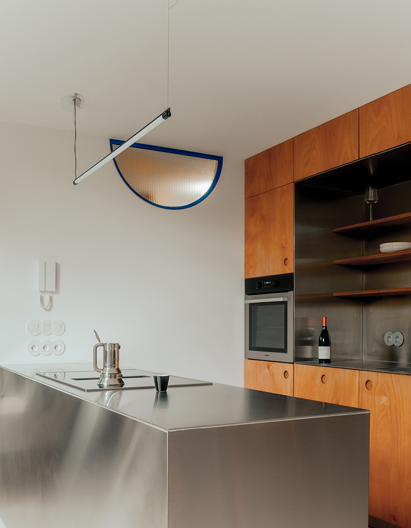 former sewage tank transforms into minimal geometric apartment in amsterdam - 4