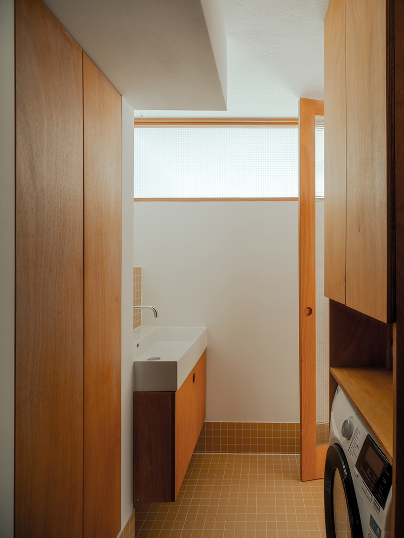 former sewage tank transforms into minimal geometric apartment in amsterdam - 8