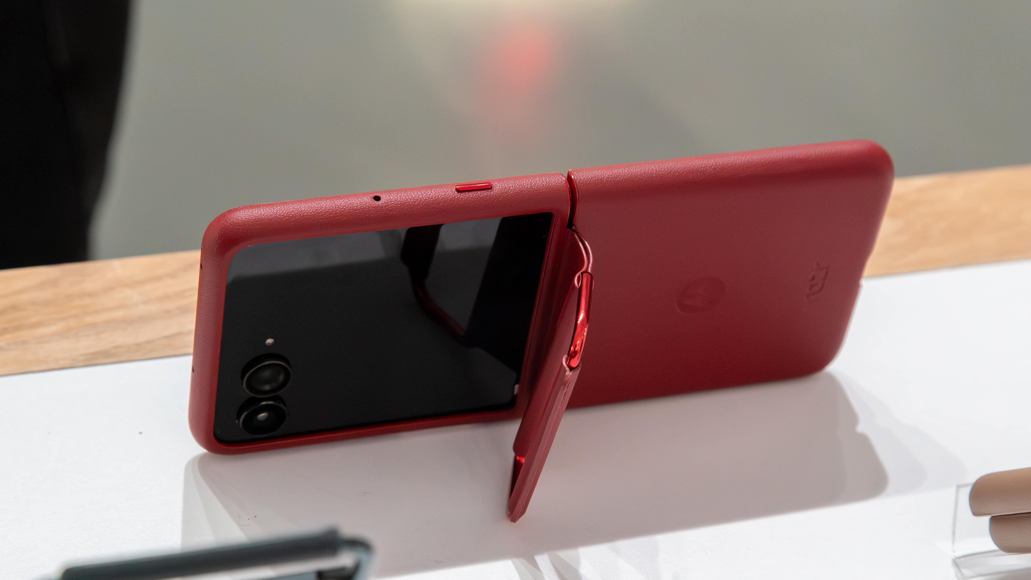 The Razr Ultra 2025 in a red ring stand case