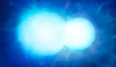 This artist's illustration shows two white dwarf stars merging. Usually, the merger creates a supernova, but new research concludes that two separate and unusual white dwarfs are best explained as merger remnants. The researchers say they are a new class of object. Image Credit: University of Warwick/Mark Garlick