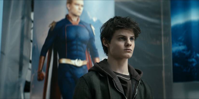 Ryan (Cameron Crovetti) standing in front of a Homelander poster in The Boys season 5
