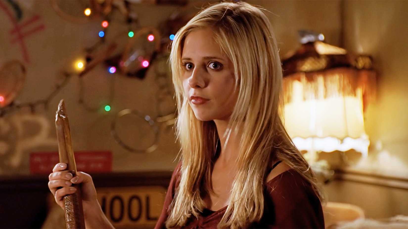 Sarah Michelle Gellar holding a stake in the Buffy episode, The Freshman, holding a stake.