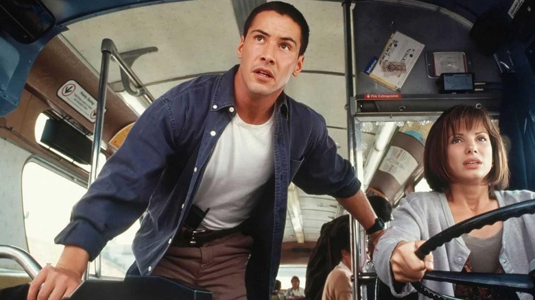Keanu Reeves as Jack and Sandra Bullock as Annie, taking the bust in Speed