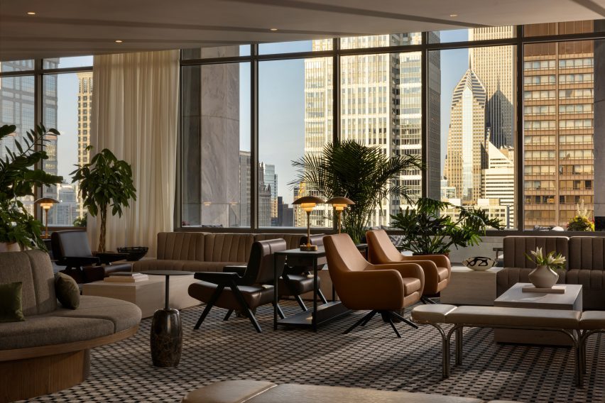Lounge on the upper level of a tower with a view of the Chicago skyline