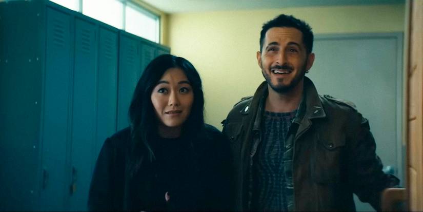 Kimiko Miyashiro (Karen Fukuhara) and Frenchie (Tomer Capone) with shy smiles in The Boys season 4