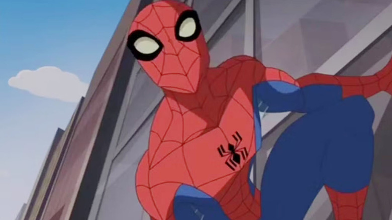 Peter Parker sticks to a building in 