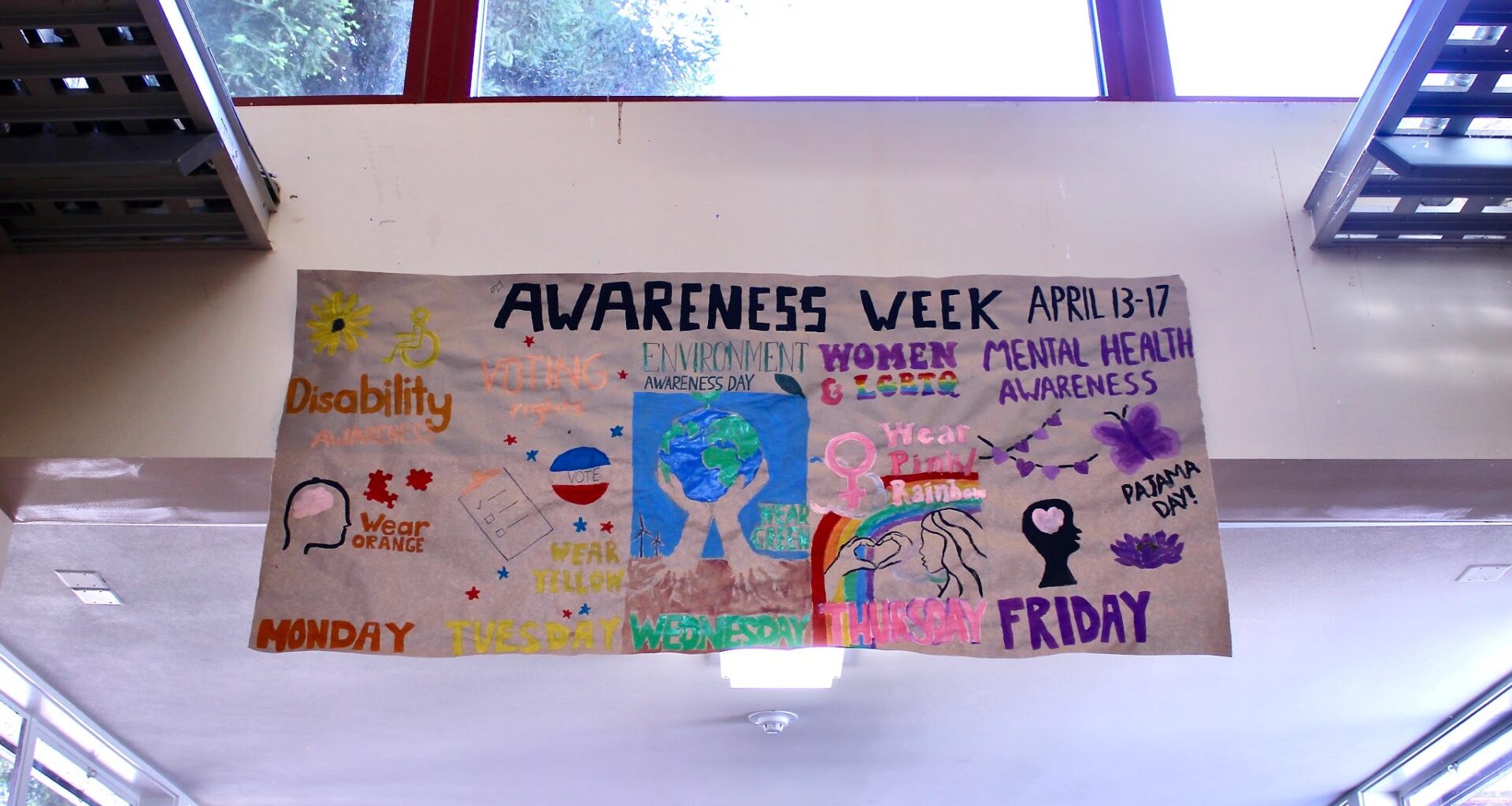 Students Gather Around Green for Annual Awareness Week