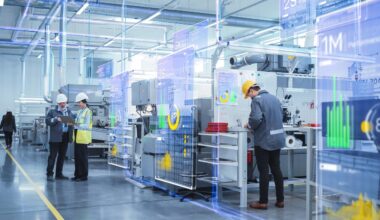 Engineers monitor AI-driven production systems and real-time data analytics inside a high-tech manufacturing facility, reflecting the shift toward Industry 4.0 and automation. (Adobe Stock Photo)