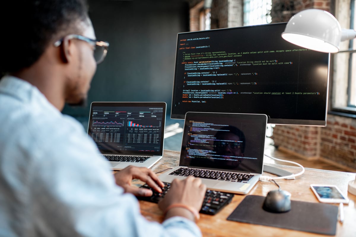 A computer programmer is writing code.