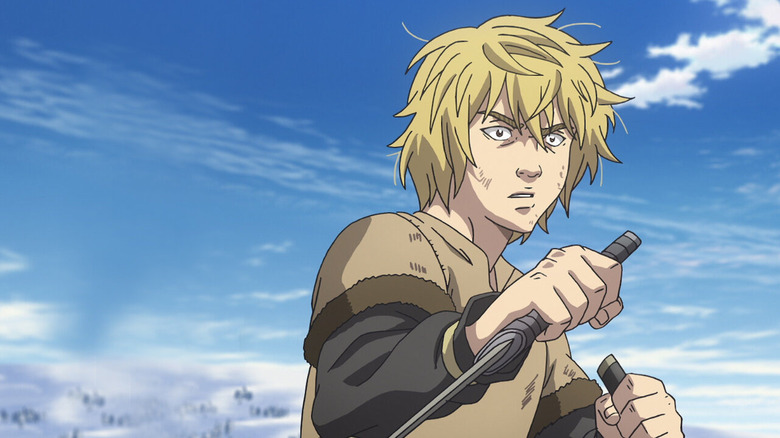 Thorfinn holds up two daggers cautiously in Vinland Saga