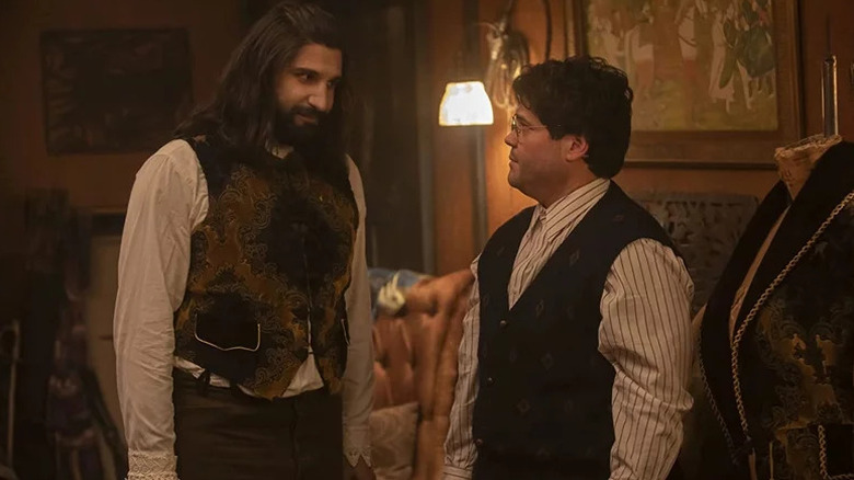 Nandor (Kayvan Novak) glances at Guillermo de la Cruz (Harvey Guillén) in What We Do in the Shadows