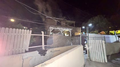 The impact site in Kiryat Shmona, on Friday.