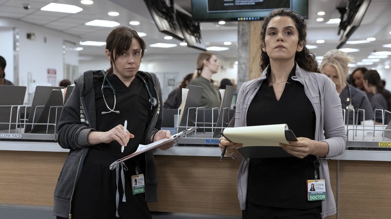 Fiona Dourif as Dr. Cassie McKay and Sepideh Moafi as Dr. Baran Al-Hashimi in The Pitt Season 2, Episode 14