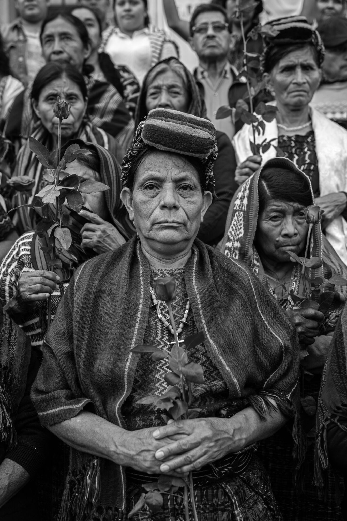 Victor J. Blue, “The Trials of the Achi Women,” for the New York Times Magazine. Doña Paulina Ixpatá Alvarado stands with other Achi women outside a Guatemala City court. That afternoon, three ex-civil defense patrollers were found guilty of rape and crimes against humanity and sentenced to 40 years in prison each. Guatemala City, Guatemala, May 30, 2025.