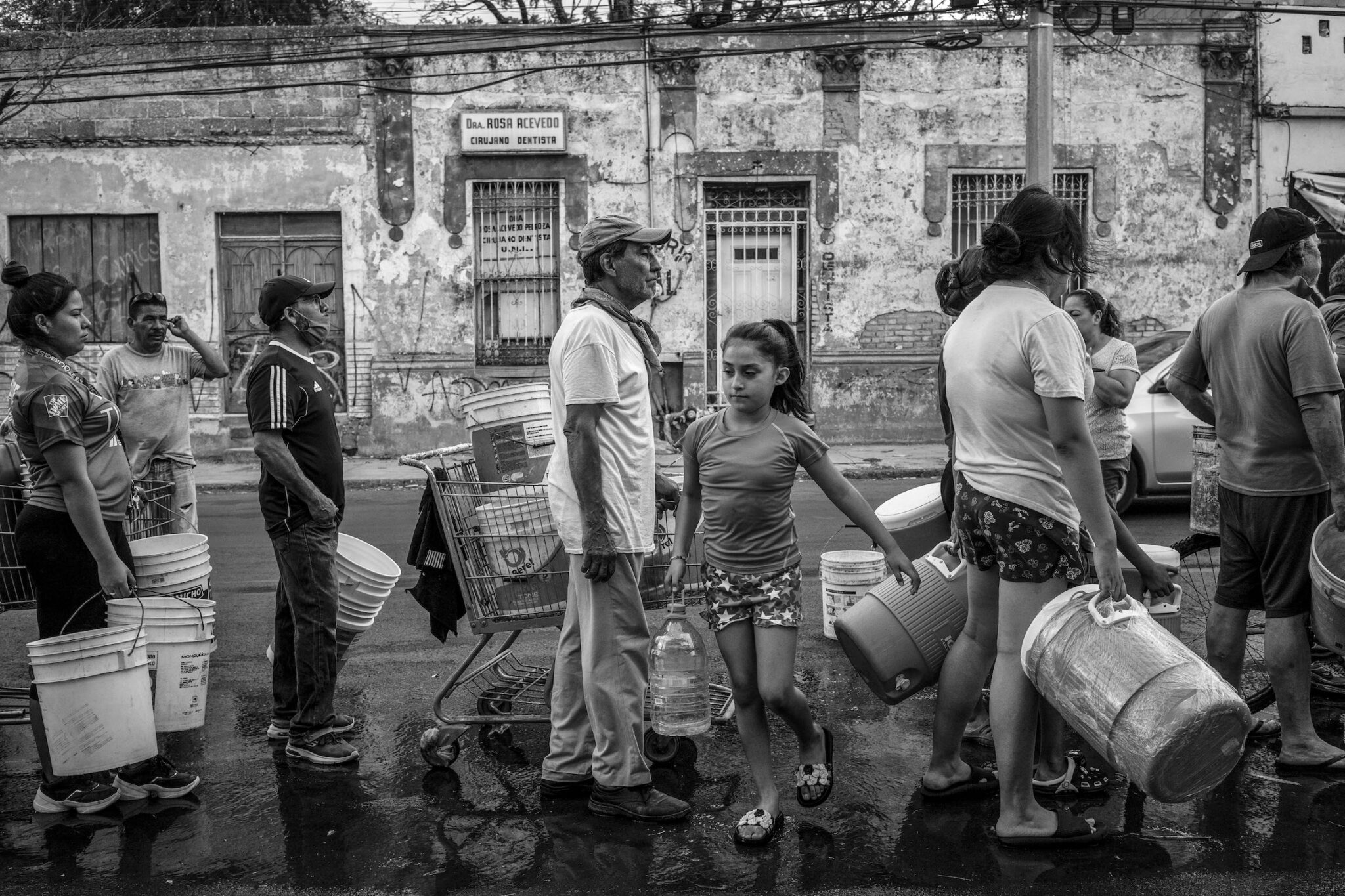 César Rodríguez, “Mexico, A Changing Climate,” for the New York Times. Residents in Monterrey line up for water. Some blocked streets to demand water service. In response, large trucks delivered water daily to the city’s most vulnerable neighborhoods. Nuevo Leon, Mexico, June 21, 2022.