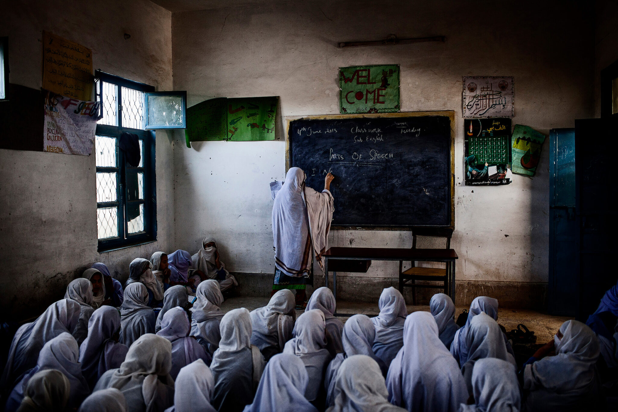 Diego Ibarra Sánchez, “Hijacked Education.” Female students attend class at their school, which was attacked by the Taliban on 21 December 2012 as part of a campaign to prevent girls from accessing education. Swabi, Khyber Pakhtunkhwa, Pakistan, June 4, 2013.