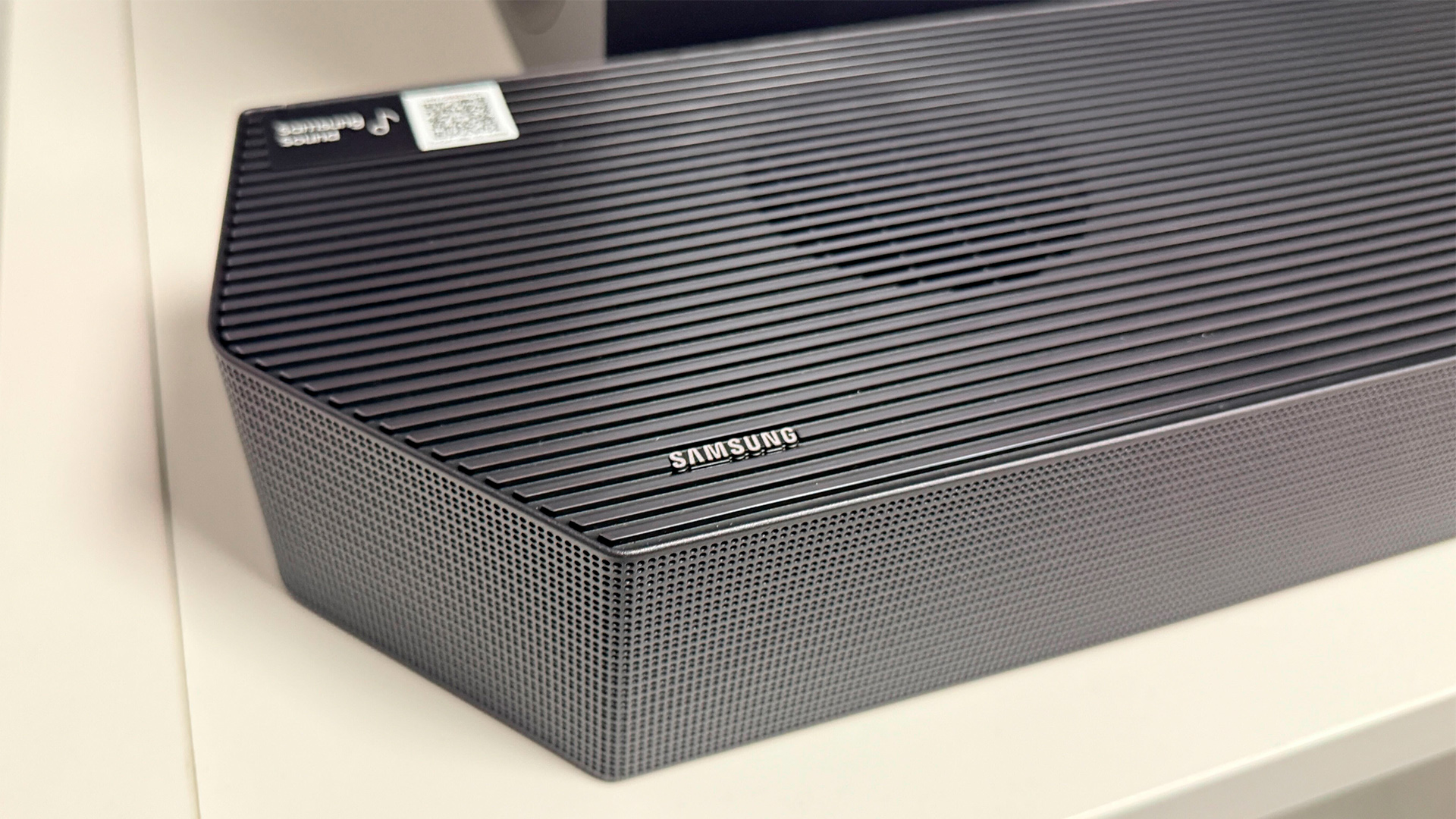 Samsung HW-Q990H soundbar package, end of bar showing Samsung logo