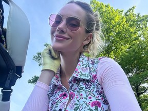 Popular golf influencer Paige Spiranac poses for a selfie.