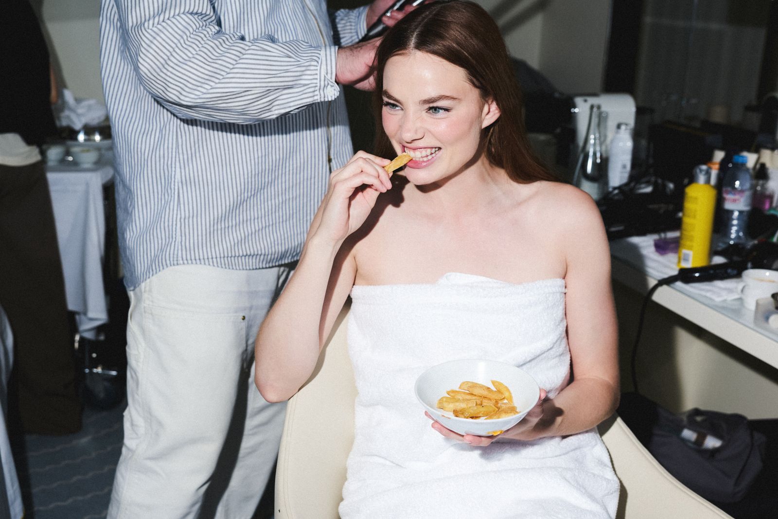 Image may contain Kristine Froseth Adult Person Wedding Eating Food Face and Head