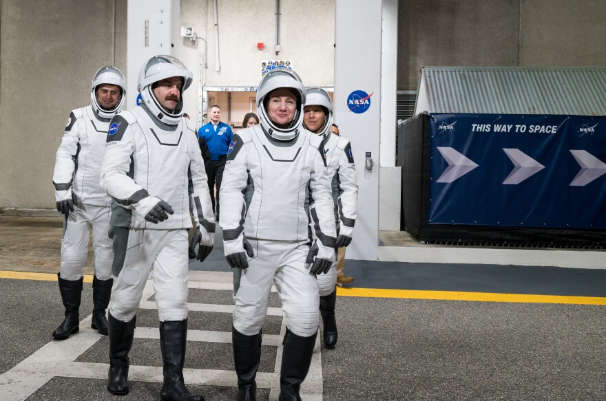 FILE: NASA astronauts Jack Hathaway, left front, Jessica Meir, right front, ESA (European Space Agency) astronaut Sophie Adenot, back right, and Roscosmos cosmonaut Andrey Fedyaev, wearing SpaceX spacesuits, are seen as they prepare to depart the Neil A. Armstrong Operations and Checkout Building for Space Launch Complex 40 on Cape Canaveral Space Force Station during a dress rehearsal prior to the Crew-12 mission launch, Monday, Feb. 9, 2026, at NASA’s Kennedy Space Center in Florida on Friday, Feb. 13, 2026.