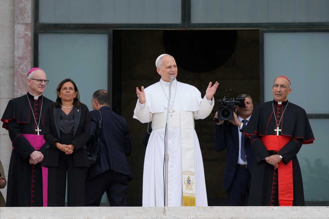 Pope Leo XIV, accompanied by, from left, Prefect of the Pontifical Household Archbishop Petar Rajič, Dean Antonella Polimeni, and his vicar for the city of Rome Cardinal Baldo Reina, visits the Città Universitaria (University City) at Sapienza University of Rome to meet with faculty and students at the institution's primary campus, one of the world's oldest and largest universities, Thursday, May 14, 2026.