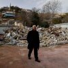 Fakhri Abu Diab, a community leader, walks by the remains of his family home, after it was destroyed by Israeli forces, in the Silwan neighborhood of East Jerusalem.