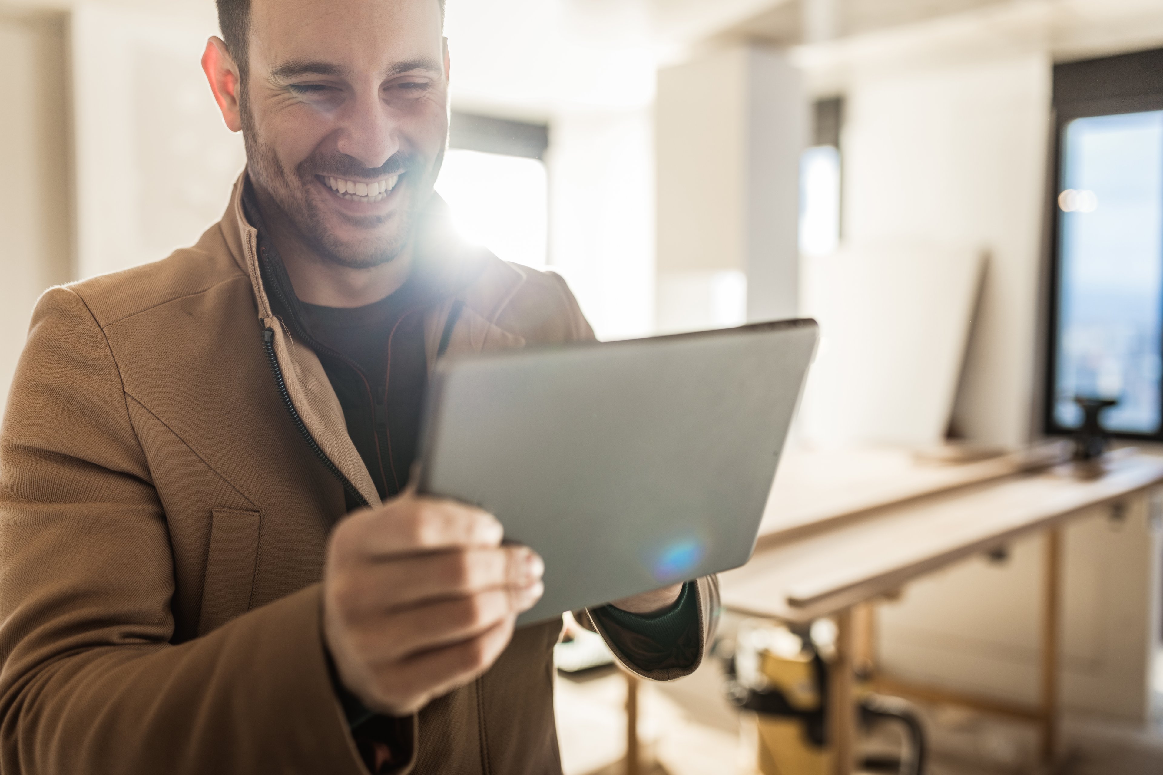 Person looking at a stock on a tablet.