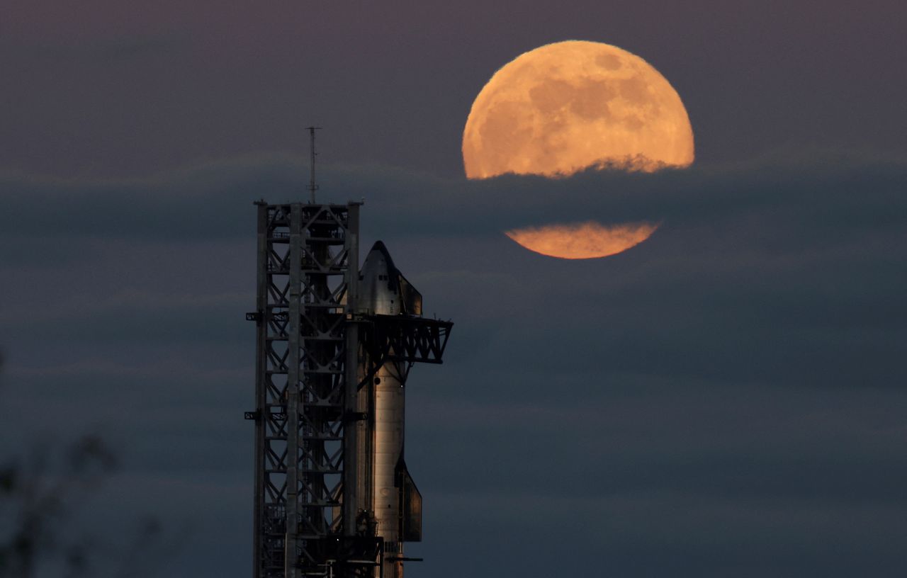 SpaceX's Starship sits on the launch pad as the Beaver moon rises in Starbase, Texas, in November 2024.
