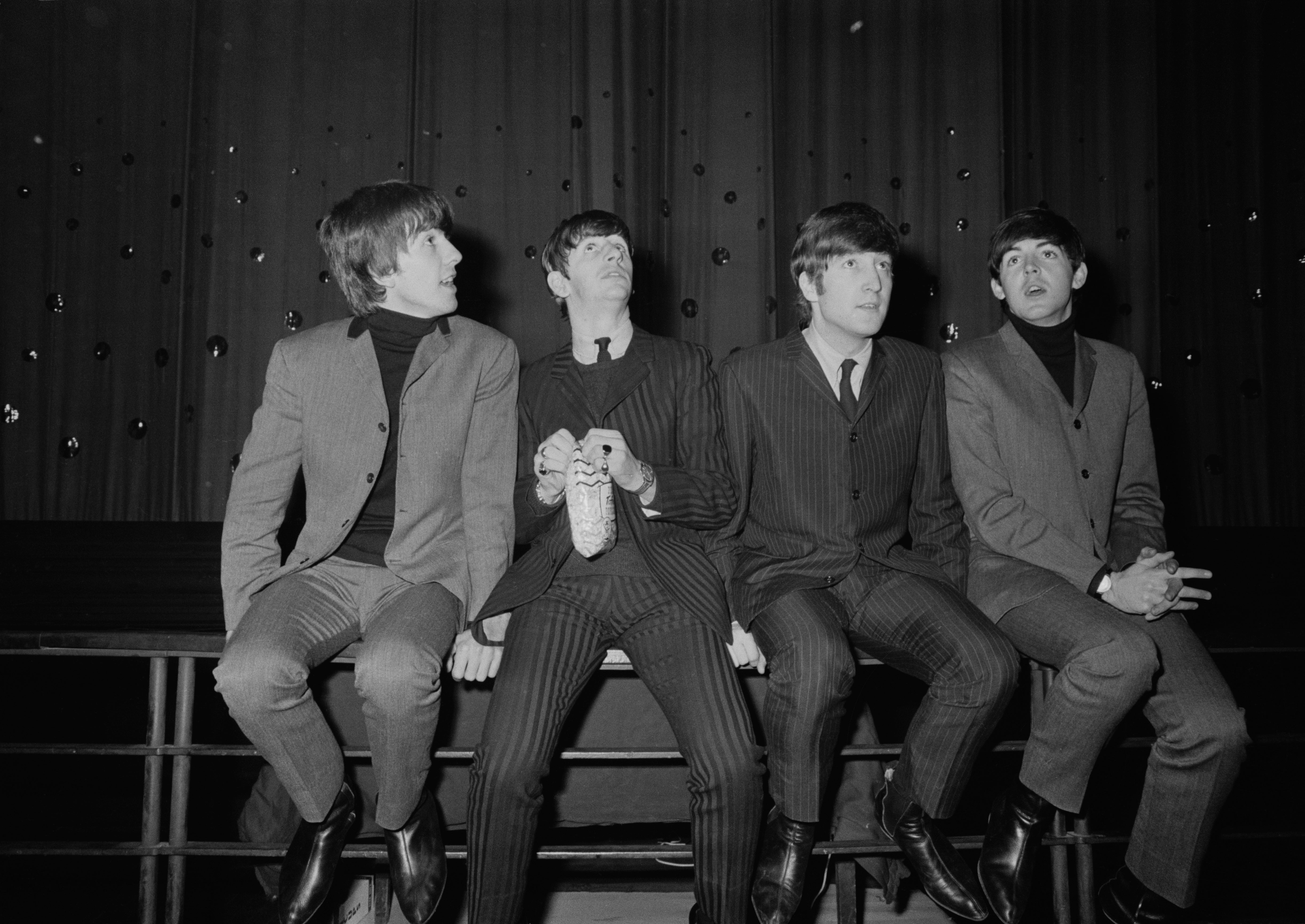 The Beatles, from left: George Harrison (1942-2001), Ringo Starr, John Lennon (1940-1980) and Paul McCartney at Lewisham Odeon, London, 8 December 1963