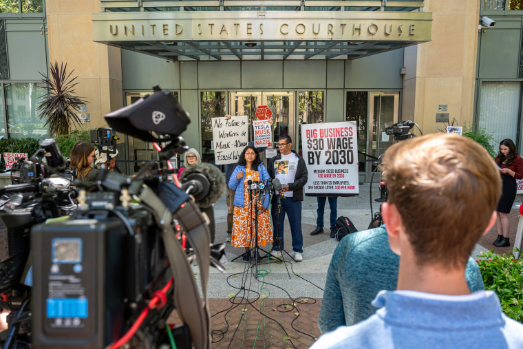 Speakers outside of the courthouse.
