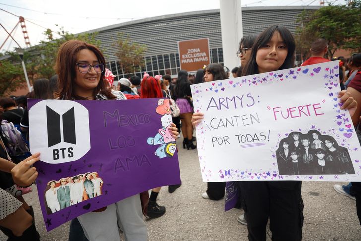 Fans of the Korean K-pop group BTS hold up signs before a concert at the GNP Stadium in Mexico City, Mexico,  May 7.  EPA-Yonhap