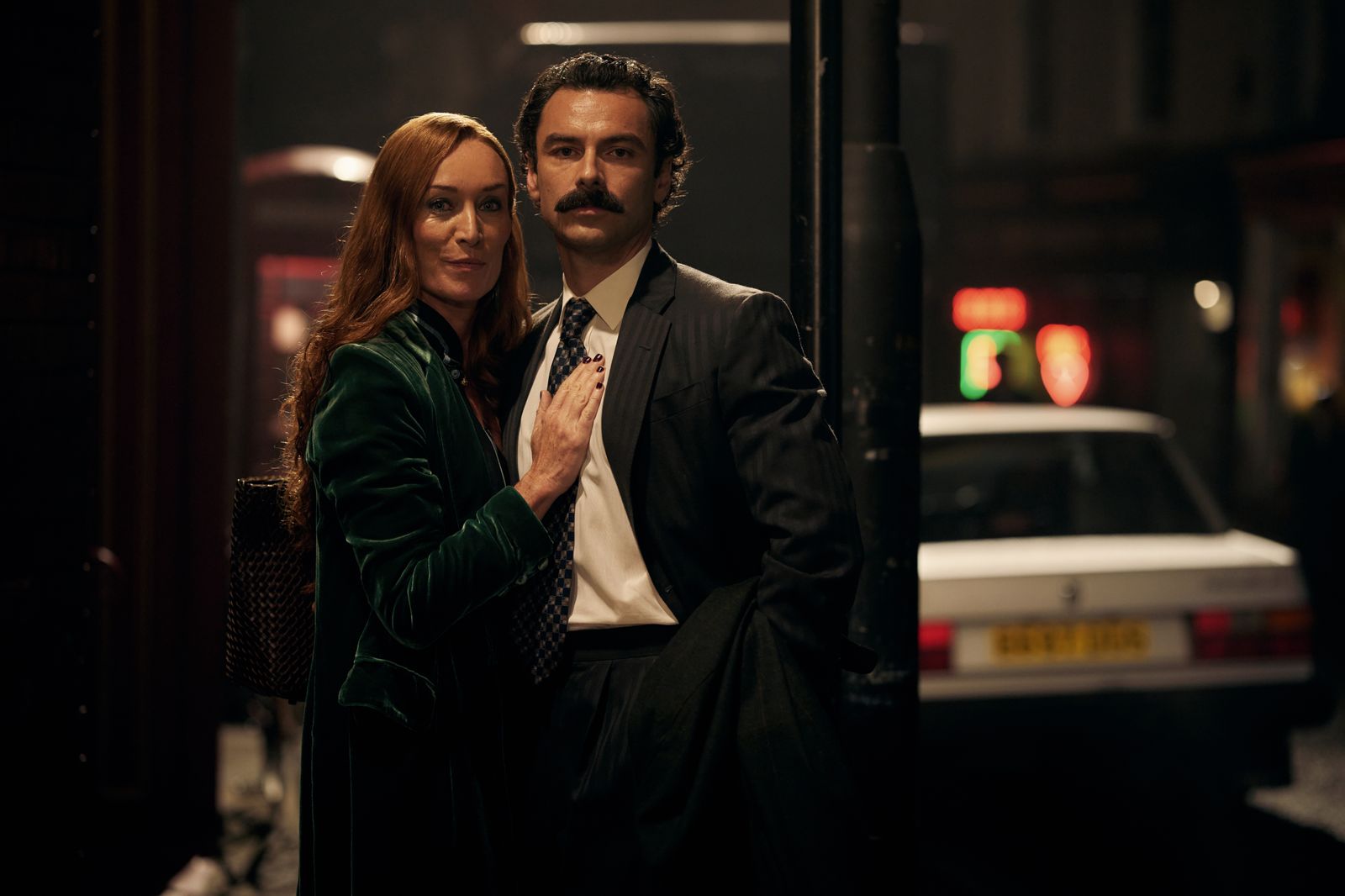 Image may contain Aidan Turner Victoria Smurfit Clothing Coat Jacket Blazer Formal Wear Suit Adult and Person