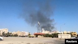Smoke rises from an area surrounding the US Embassy in Bayan, Kuwait. The small Gulf nation has been one of the US allies hit by Iranian retaliatory strikes.
