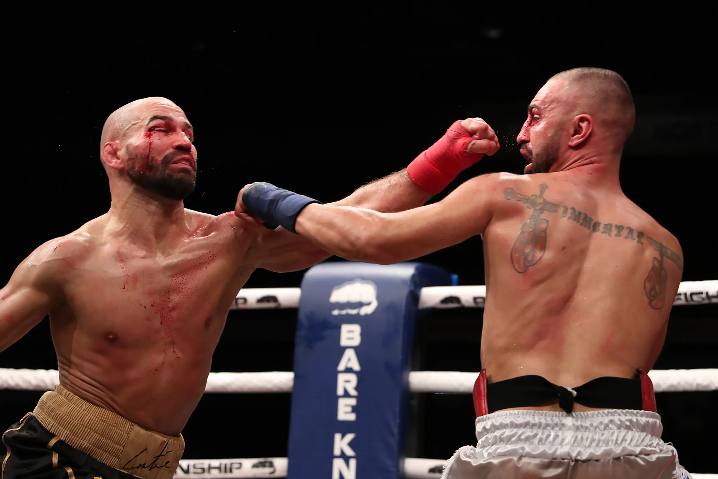 Paulie Malignaggi and Artem Lobov exchanging blows during Bare Knuckle Fighting Championship.