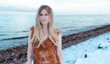 Myrkur press image 2026, Amalie Bruun stands on a snow-covered beach